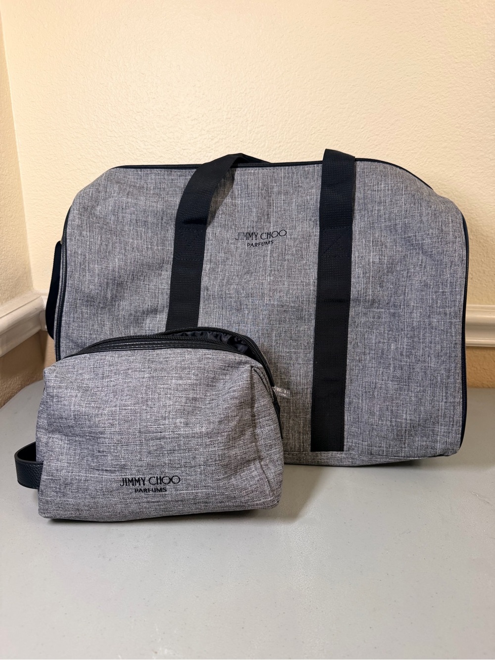 Jimmy Choo Gray Travel Tote and Toiletry Pouch